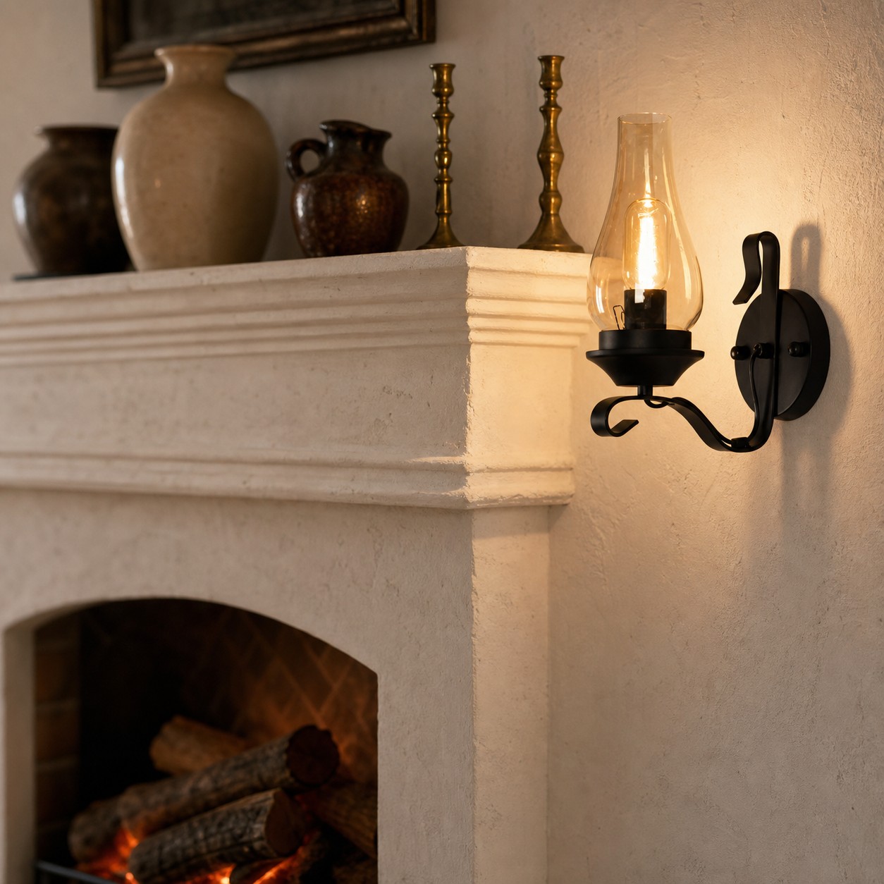 Kerosene style wall lamp glowing beside a fireplace mantel