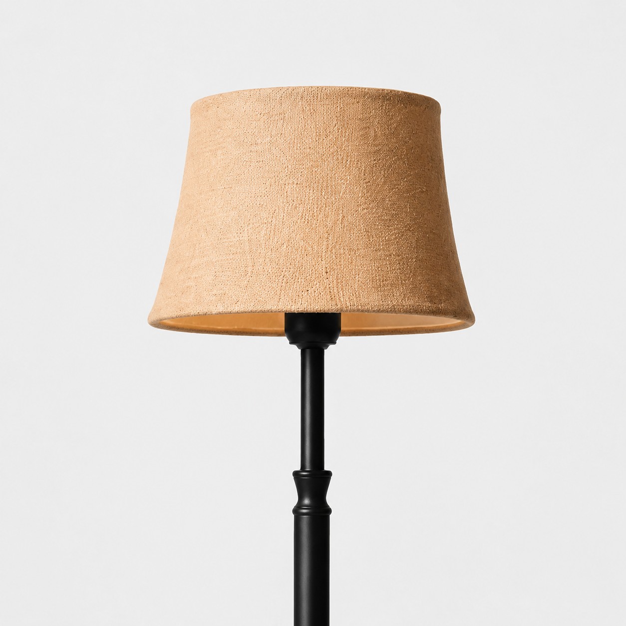 Close-up of woven fabric floor lamp shade texture and finished edge